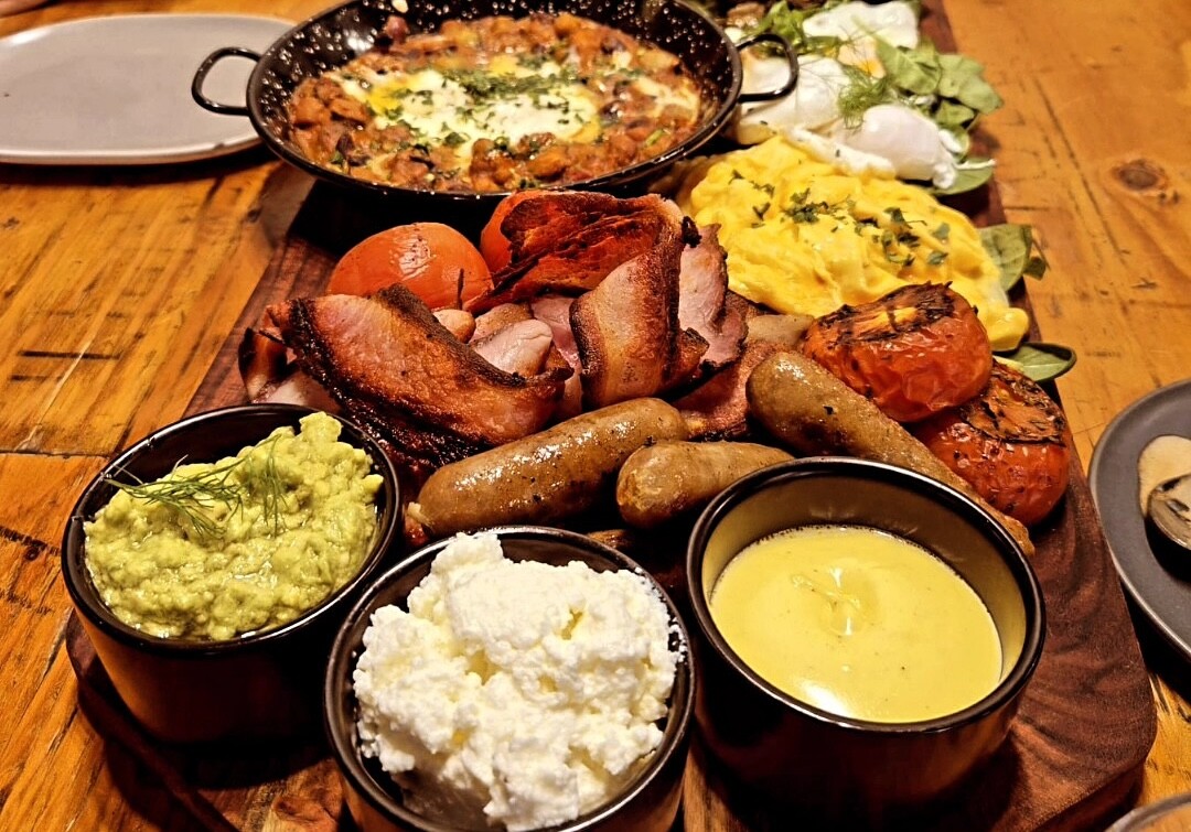 A smorgasbord of food on a table at The Pourhouse, a restaurant in Dunsborough