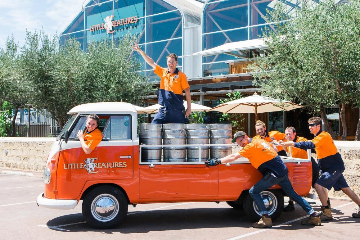 A group of people posing on the van outside of Little Creatures brewery. A great place to get craft beer in Perth