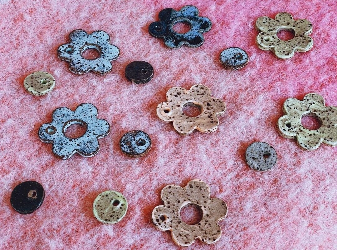 A painted pottery set of a of beads at Prickly Pear Studios. One of Perth's best beginner pottery workshops