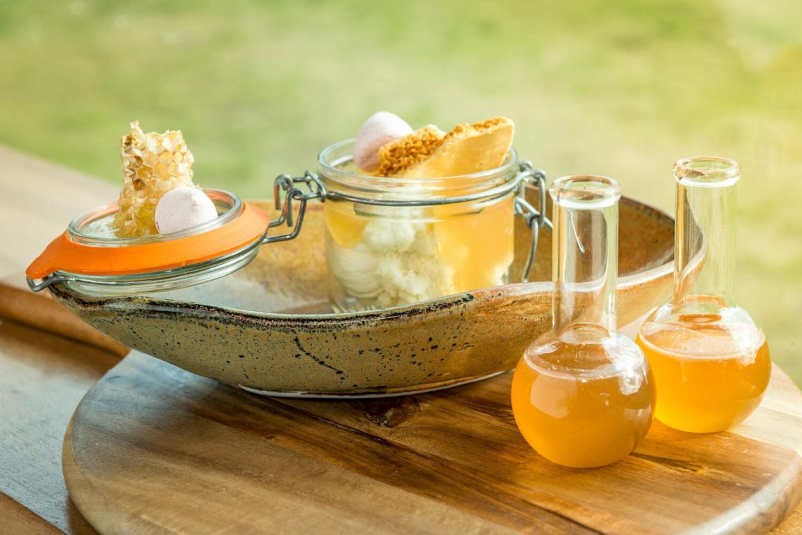 A display of honey sits on  a bench on the barnstore at Barnyard 1978 in Yallingup 