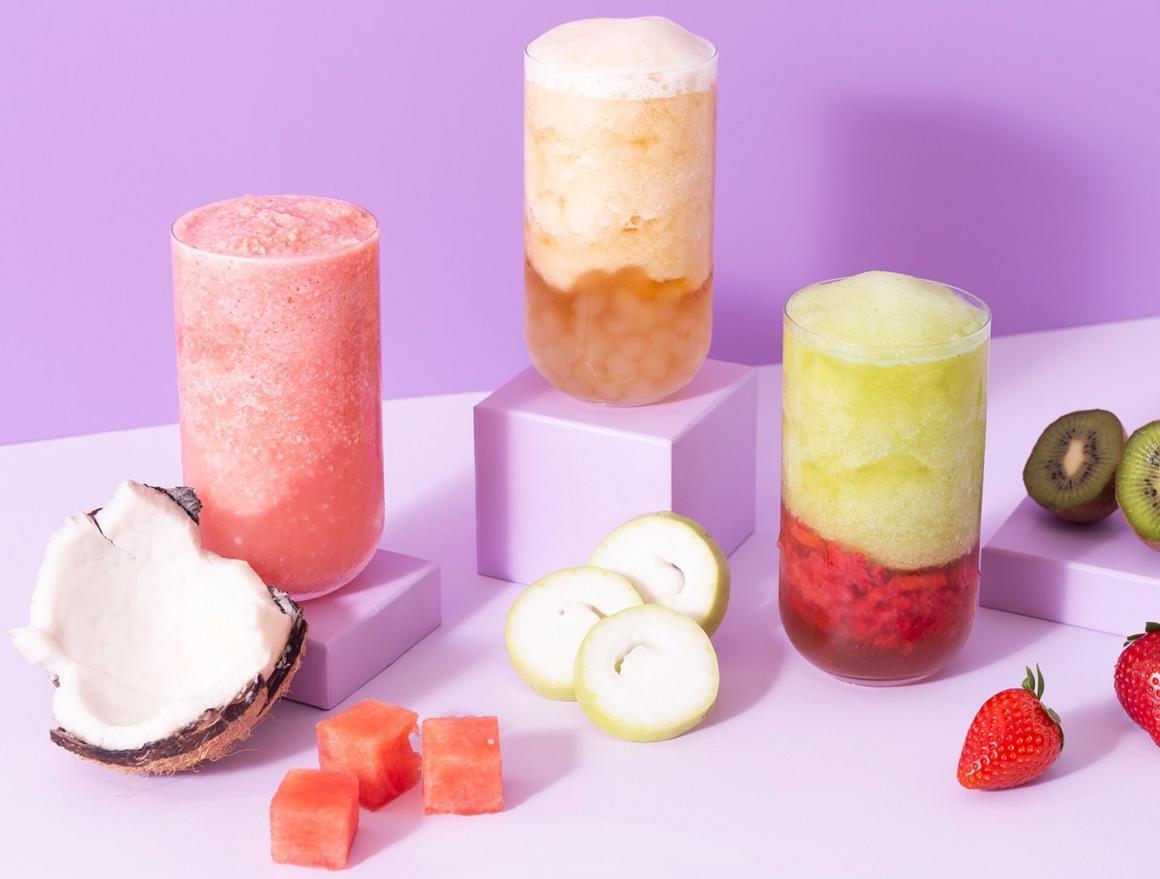 Three colourful bobas on a purple background from Boba Boba one of the best bubble tea places in Perth