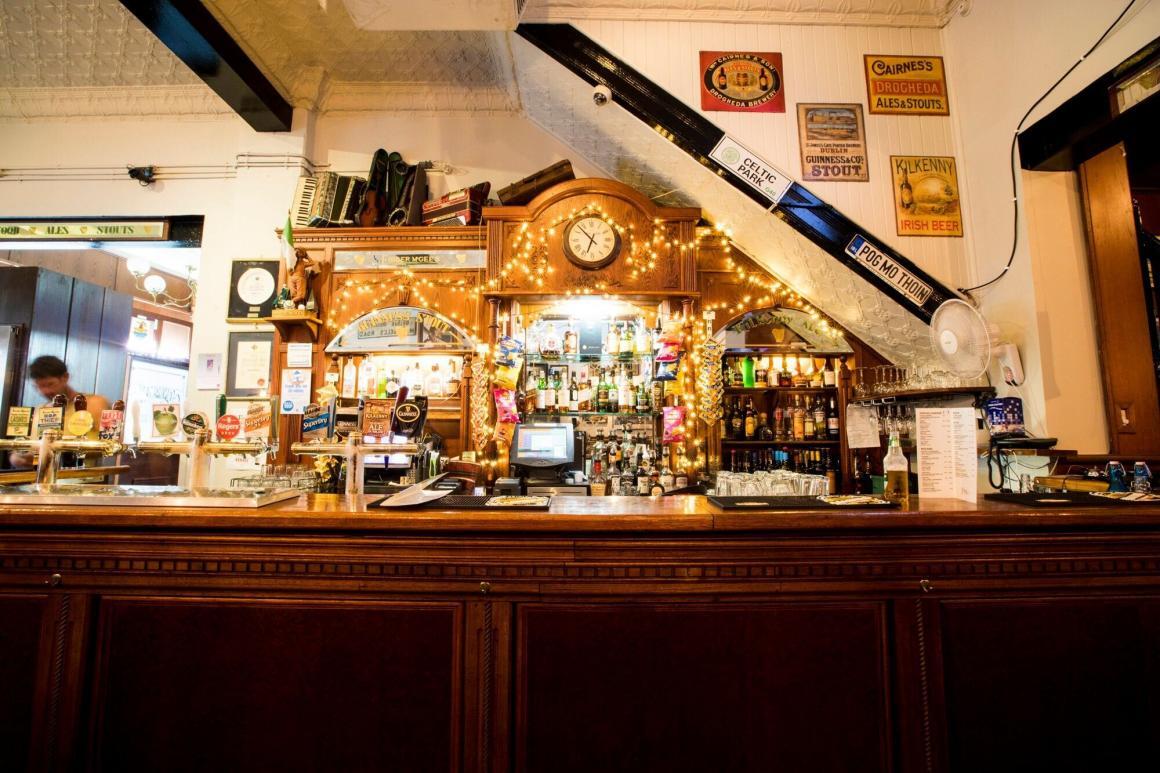 The bar at Fibber McGee's showing all the Irish decorations and alchol choices