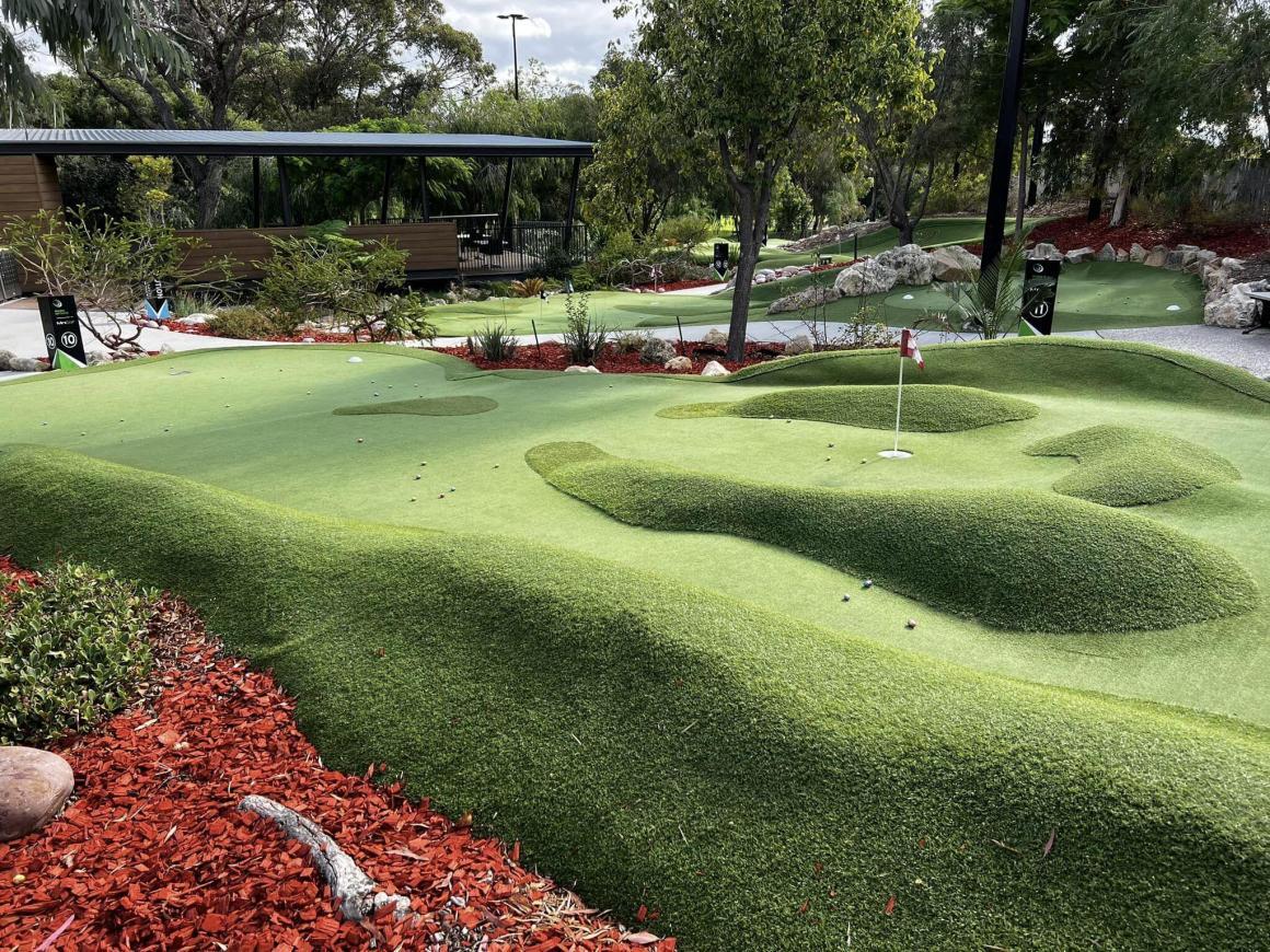 A wide angle low view of the Wembley Mini Golf Course