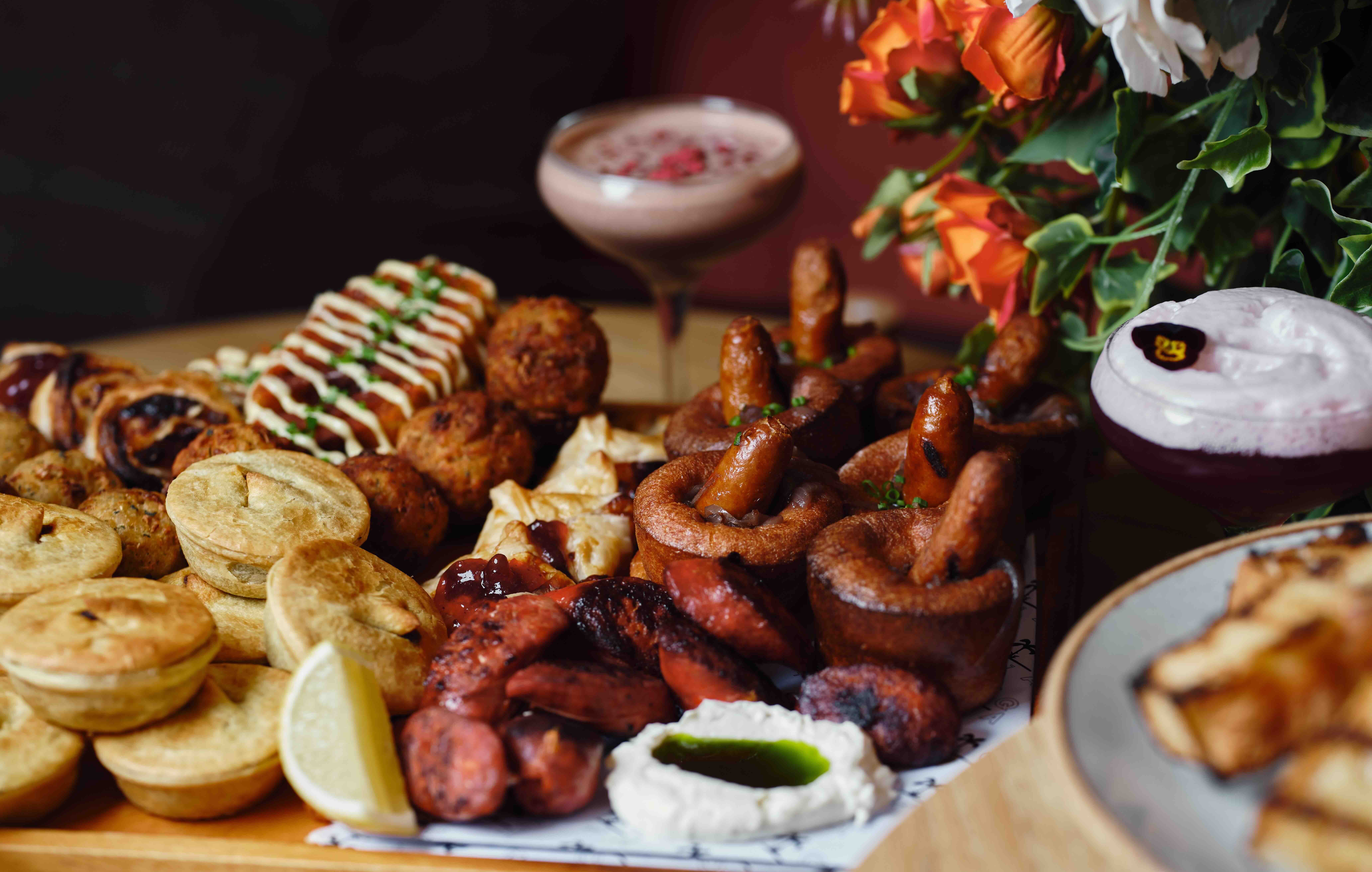 A close up of the grazing board with winter cocktails