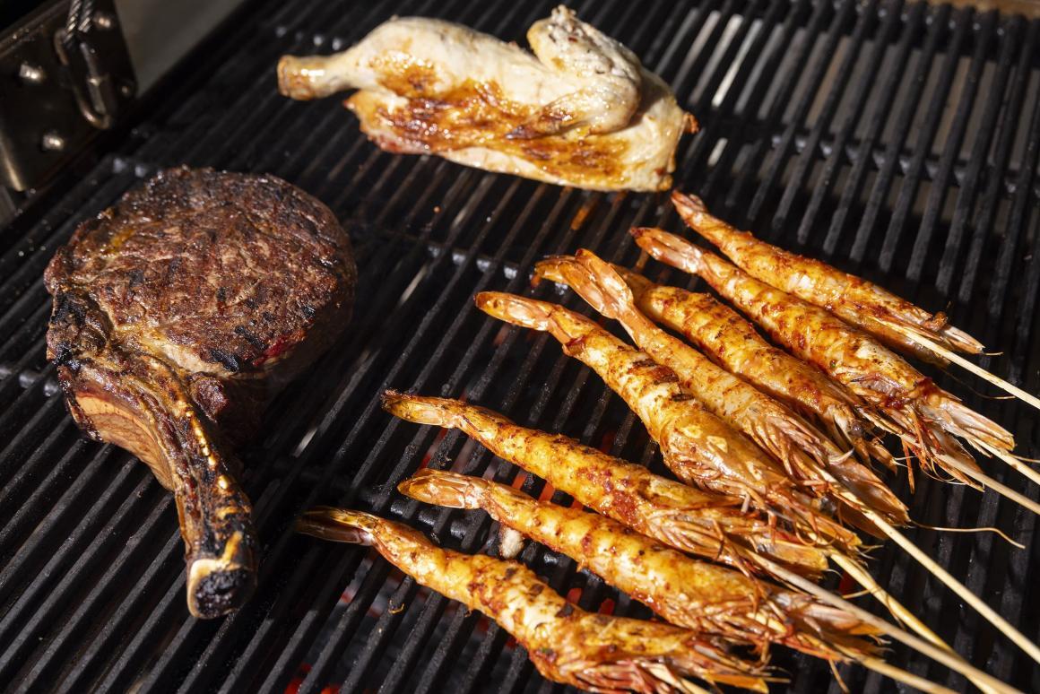 A grill full of meat and prawns Cassia restaurant in Fremantle