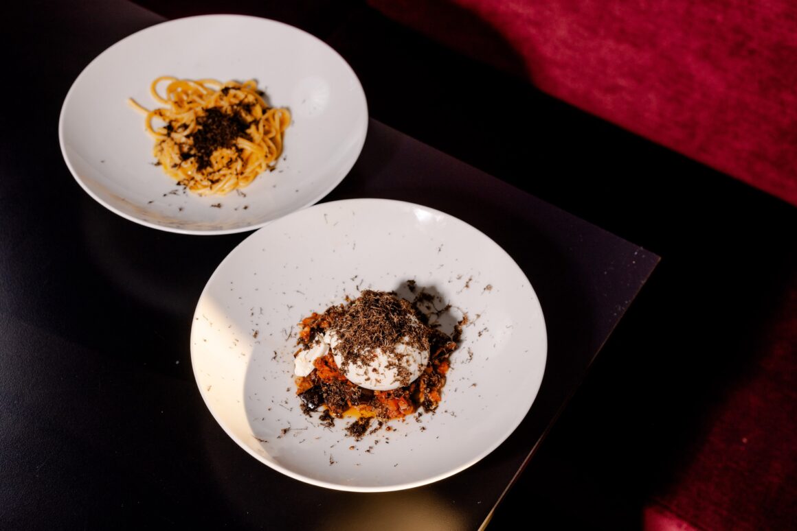 Two truffle dishes set on a table at Cosy Del's during the Truffle Five-Course Dinner