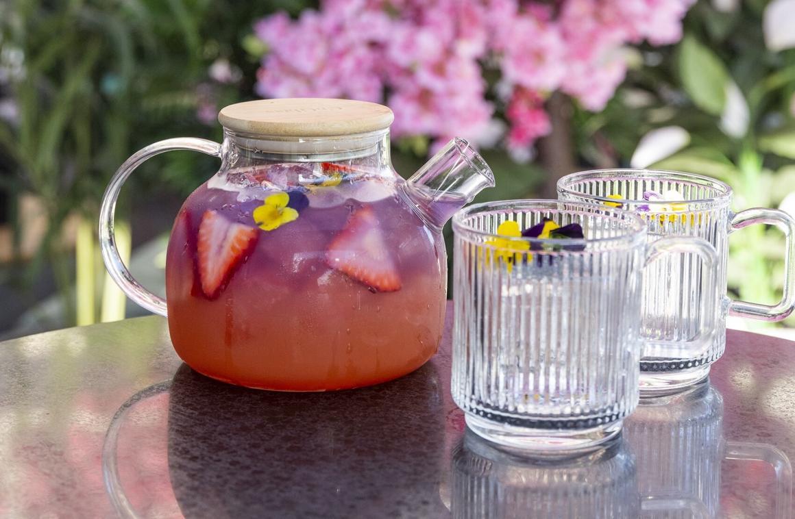 A teapot Japanese cocktail displayed at Rooftop at QT's Zen Garden