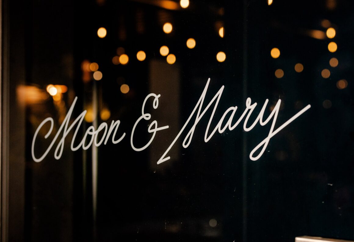 A shot of the Moon & Mary sign on the front of the restaurant in Freo