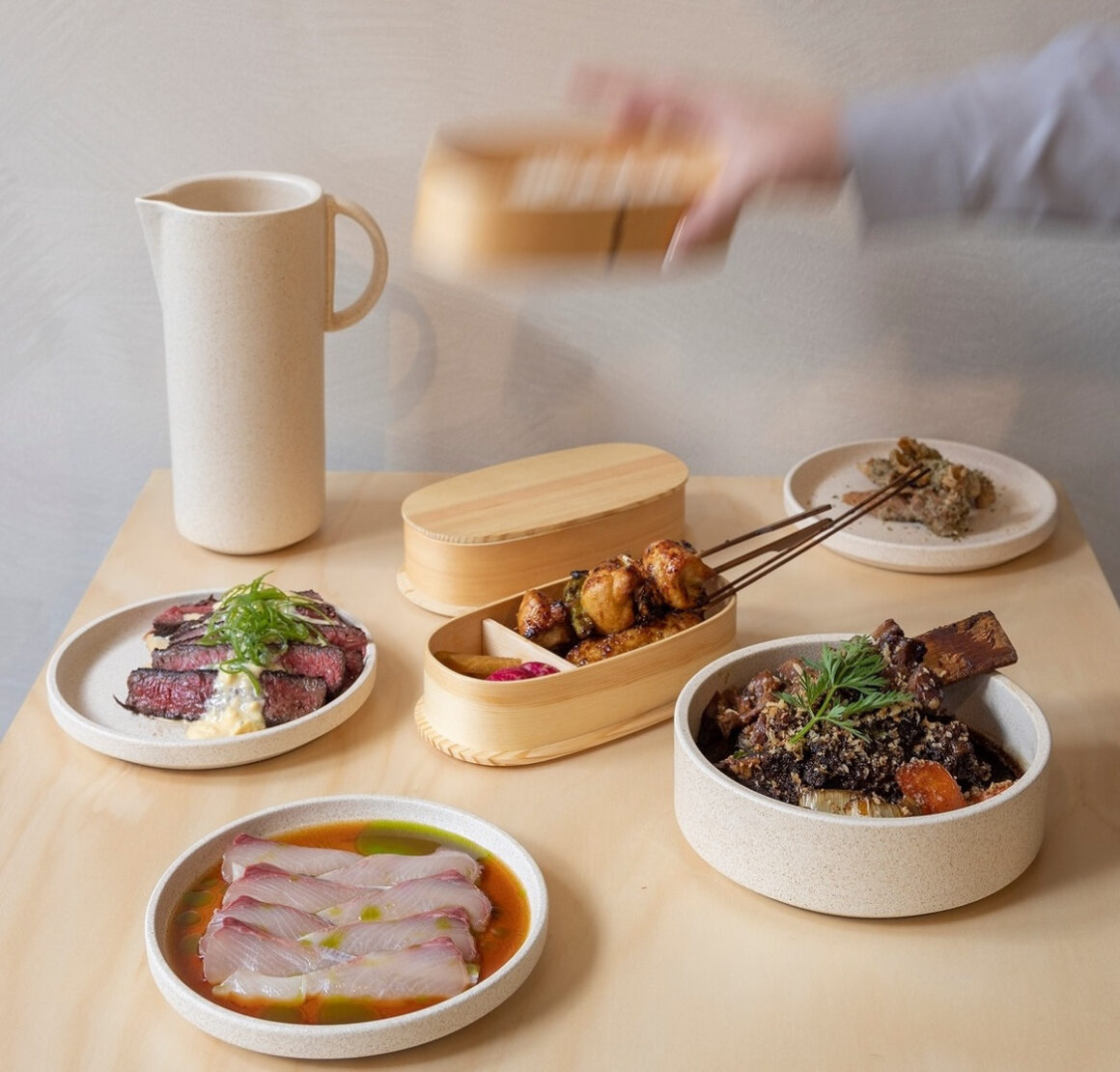 A spread of food and drinks on a table at new japanese restaurant in Perth Hiyori