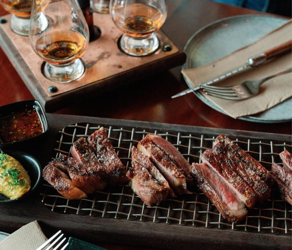 Three different stakes on a grill plate at Samson's Paddock, one of Perth's best steakhouses 