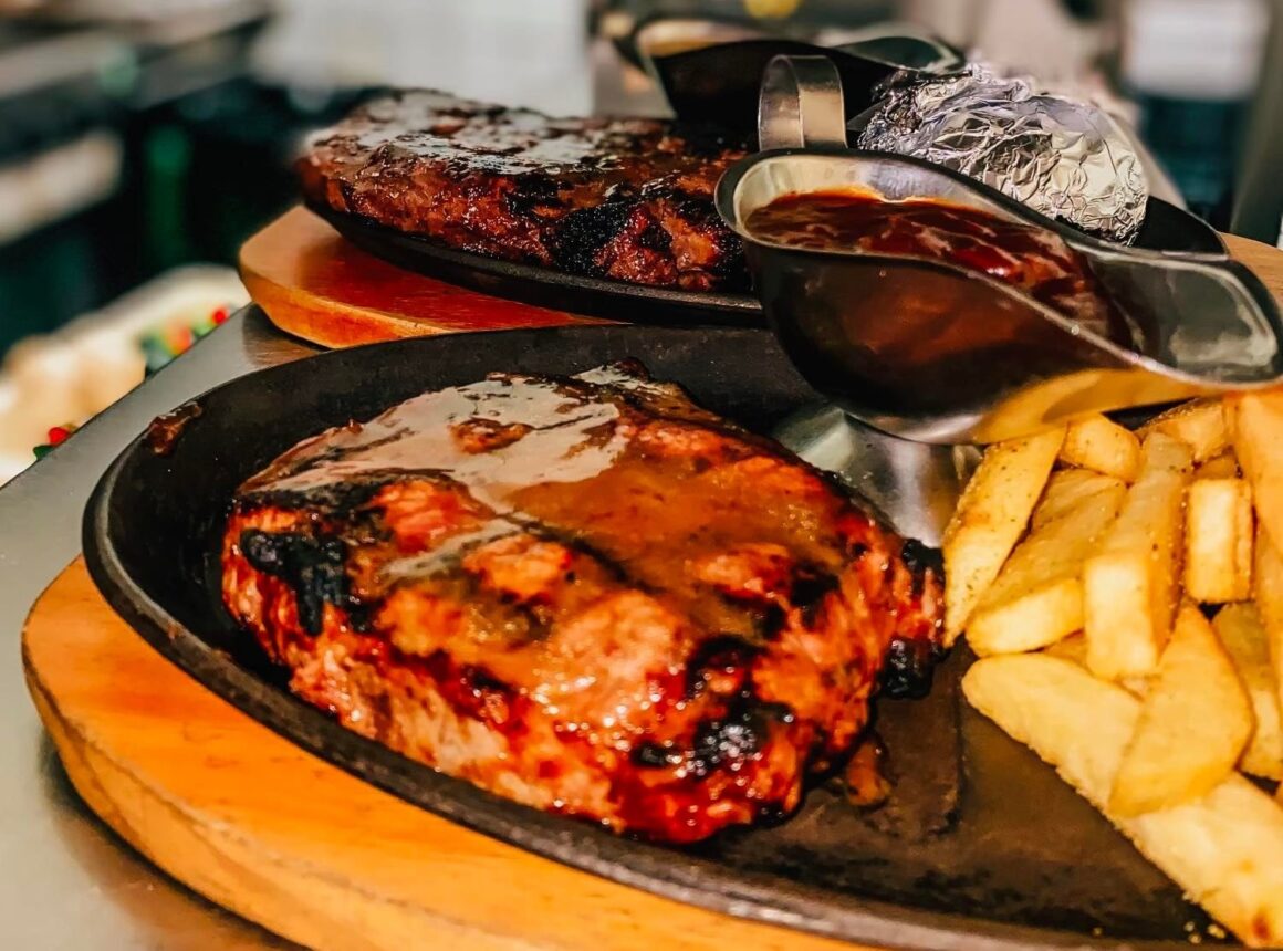 Steak and sauce on at plate at Squires Loft, one of Perth's best steakhouses 