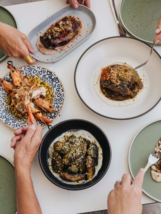 A spread of food on the table at INARA, one of the best food spots in Busselton