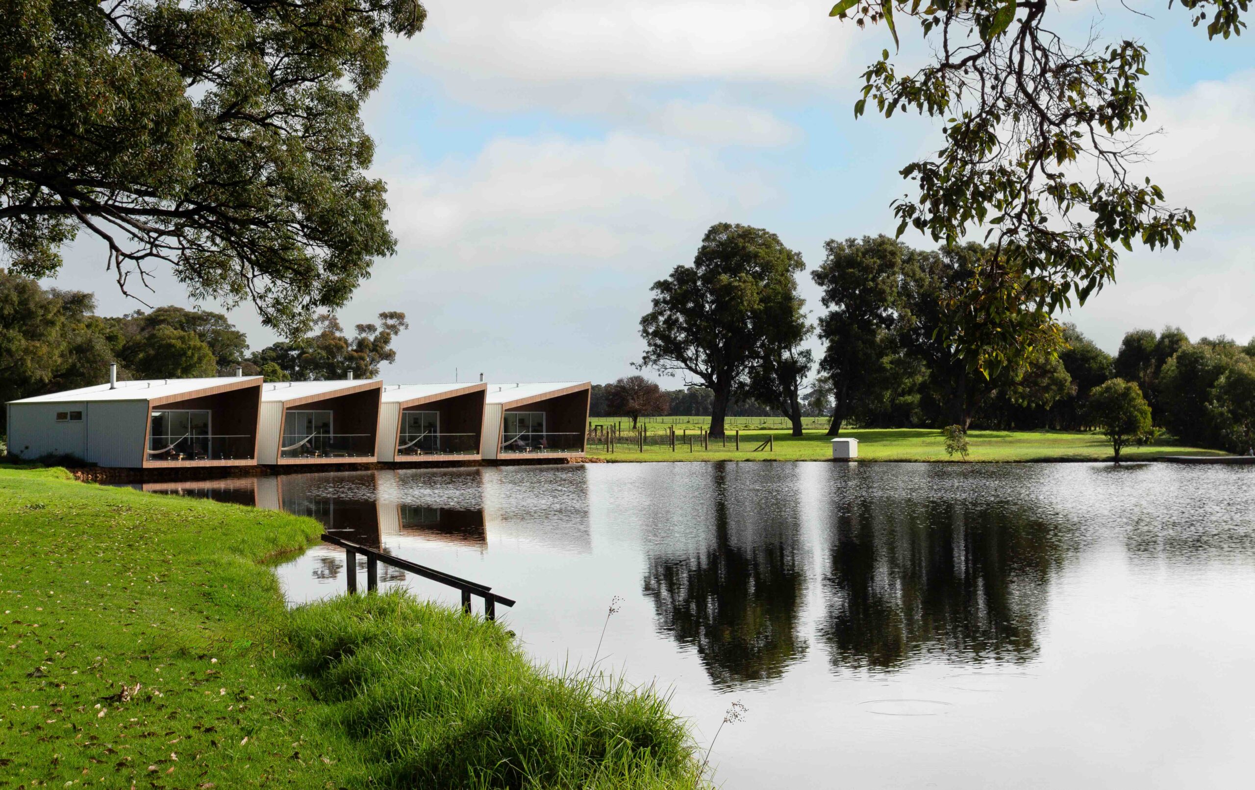 An outside view over the lake of Edge Luxury Villas