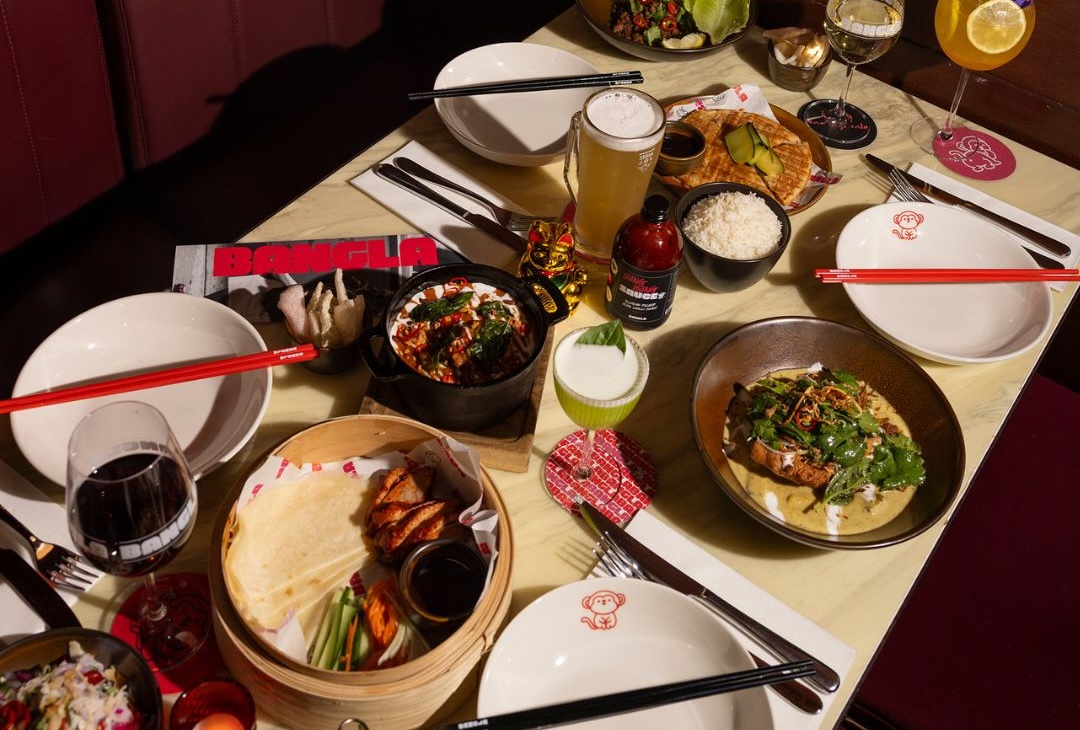 A table of food at BANGLA, one of the best places to eat for Father's Day